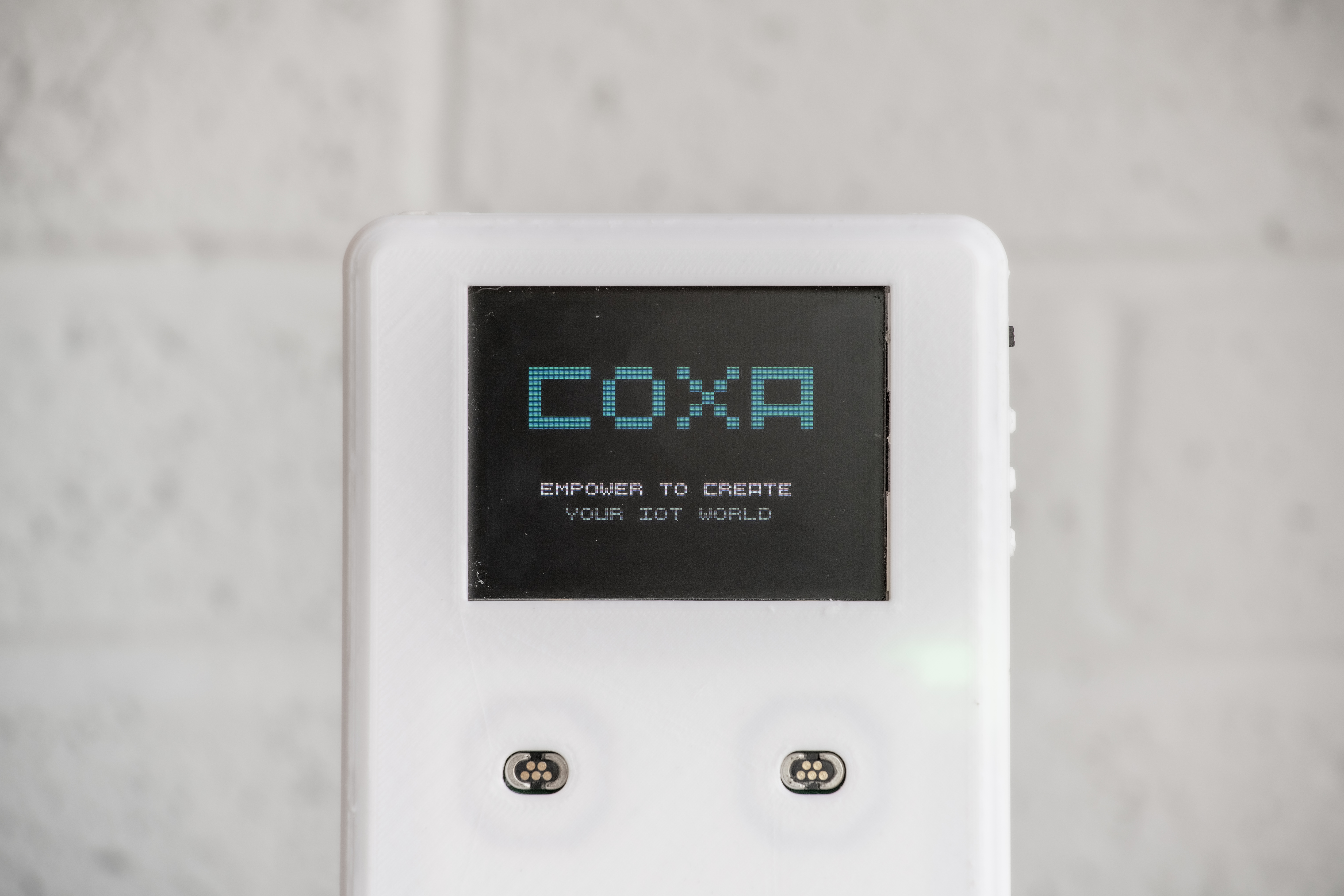 Iridescent ripples of a bright blue and pink liquid